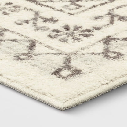 4 x 5’6 Distressed Persian Accent Rug Cream - Threshold