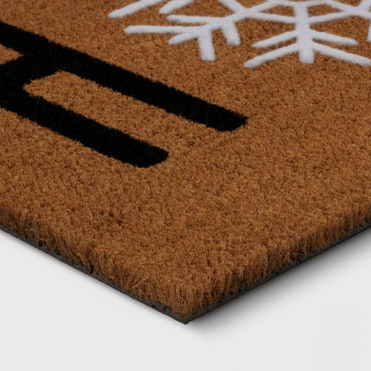 1'6"x2'6" Christmas Snowflakes 'Home' Flocked Coir Doormat Black/White - Wondershop™: Outdoor Medium Pile